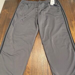 New with tags men’s Adidas 2XLT gray with black stripes on side